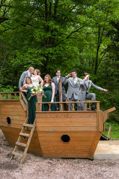 Whole wedding party on the Pirate ship playground at Fawn Hollow Acres