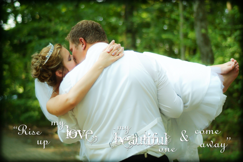 groom holding bride, dipping back and kissing