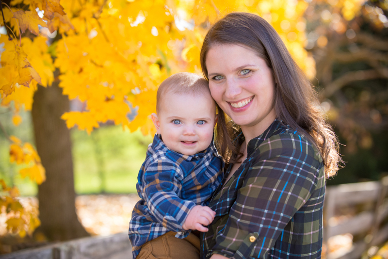 mommy and little baby boy in fall leaves