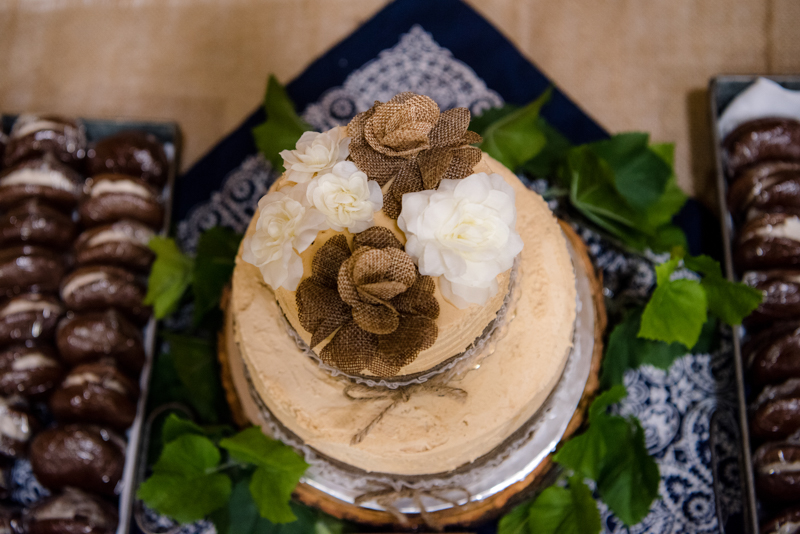 Wedding cake with peanut butter icing with burlap flowers on the top and whoopie pies on both sides. Taken by J & D Studio, Harrisburg Photographers